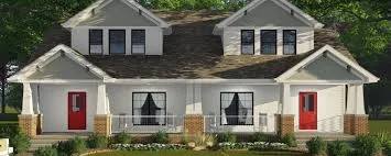 Duplex house with two red doors.