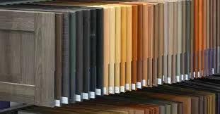 Wooden cabinet door samples in various colors.