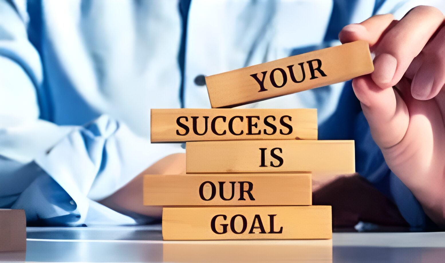 A image contains your success is our goal