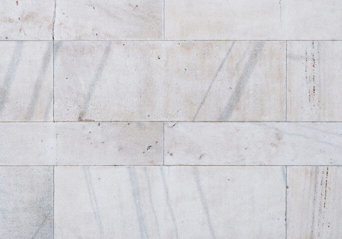 White marble wall with subtle gray veins.